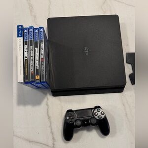 Sony PlayStation 4 Gaming Console + Controller + Games -+ Charging Station